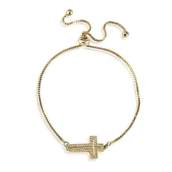 ClaudiaG Collection gold tone cross jewelry bracelet with sparkling detail and adjustable chain