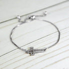 ClaudiaG Collection Silver Tone Adjustable Bracelet featuring Gold Tone Cross Jewelry with Sparkling Details