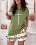 Women's green faith graphic tee and tie-dye shorts, comfortable loungewear
