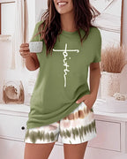 Women's green faith graphic tee and tie-dye shorts, comfortable loungewear