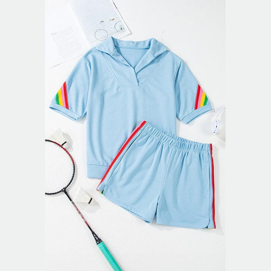 Light blue lounge set with red and rainbow stripes on sleeves and shorts edges green colorblock lounge set