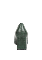 Women's green dress pumps for travel with textured design
