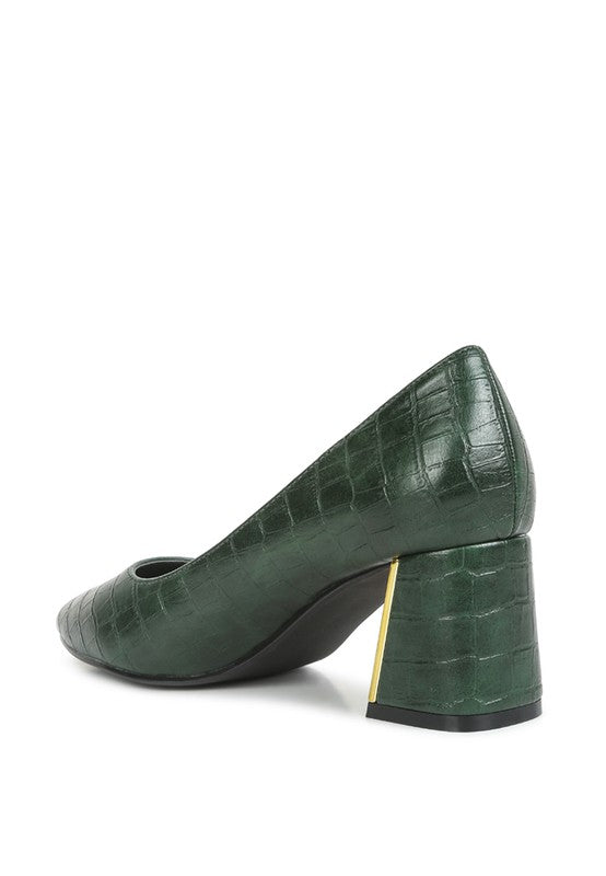 Women's green dress pumps for travel with a stylish crocodile texture