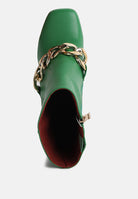 Green platform ankle boots by London Rag International with a stylish gold chain detail