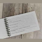 Guest book for vacation homes featuring prompts for memories and favorite places