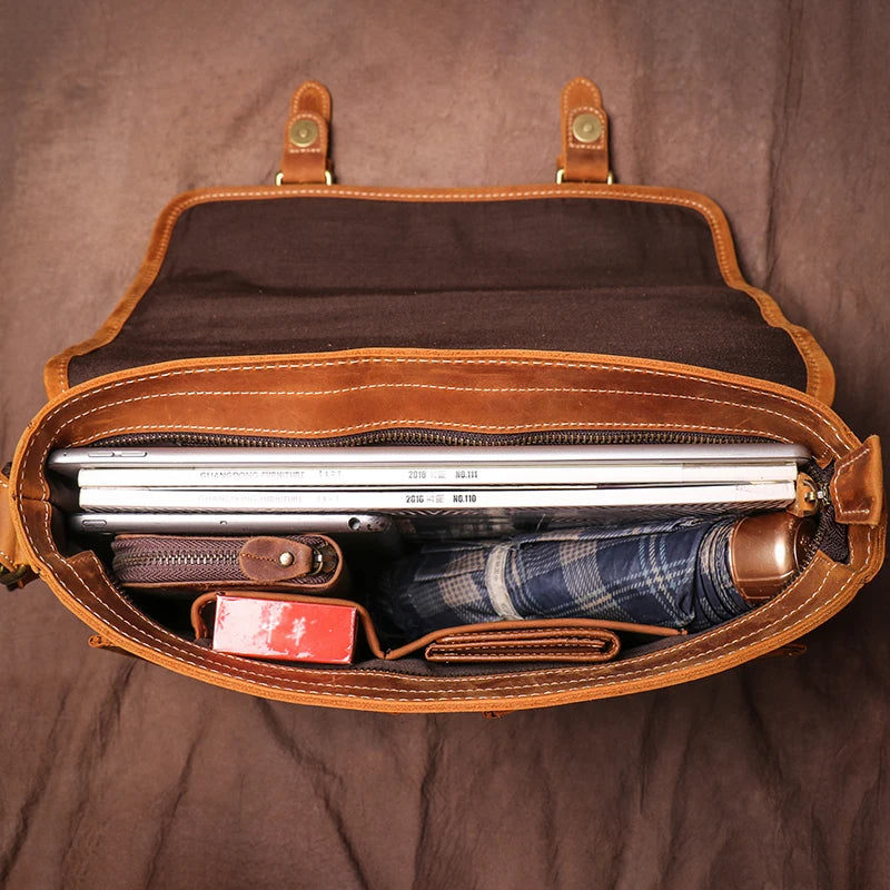 Brown messenger leather bags with spacious interior for laptops and essentials