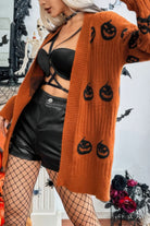 Halloween cardigan for women in orange with black pumpkin designs, perfect for festive fall style