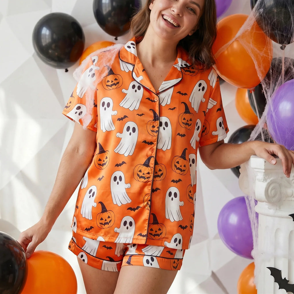 Halloween pajamas in orange with ghost and pumpkin prints for festive nights