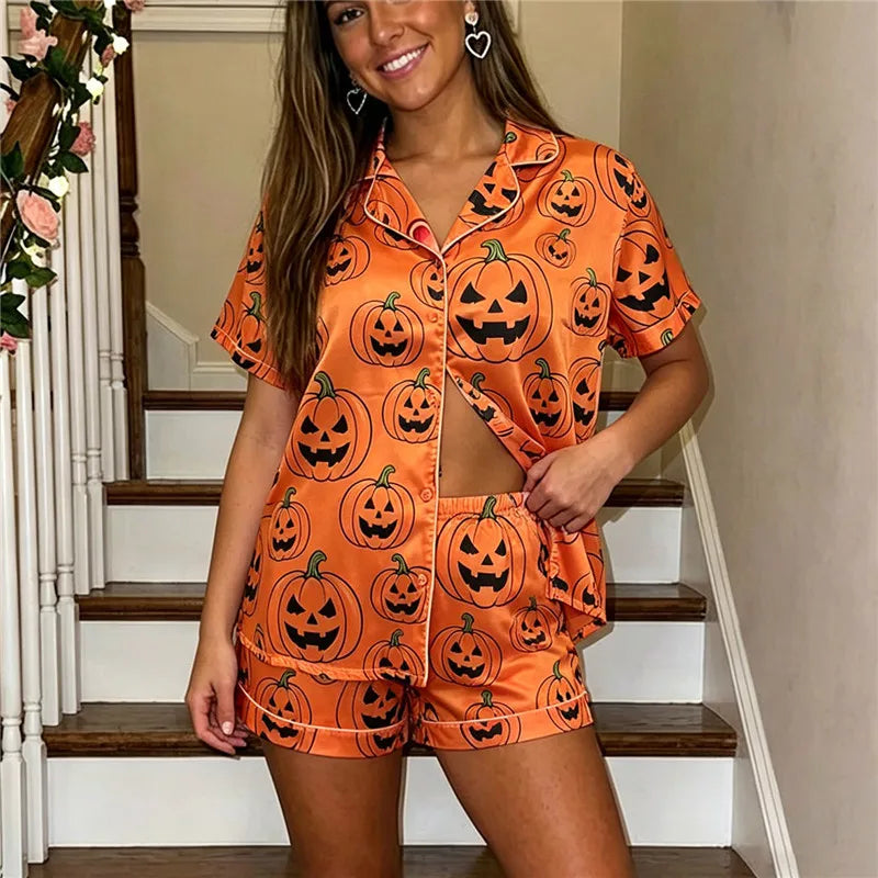 Women's orange Halloween pajamas with pumpkin print for festive sleeping