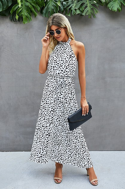 Women's halter dress in black and white polka dots for summer events