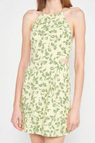 Emory Park halter neck floral mini dress in green and cream with a stylish cutout design