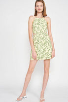 Emory Park halter neck floral mini dress in light green with a vibrant floral pattern for a fresh summer look