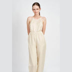 Emory Park halter neck jumpsuit open back in beige with a relaxed fit and elastic waistband