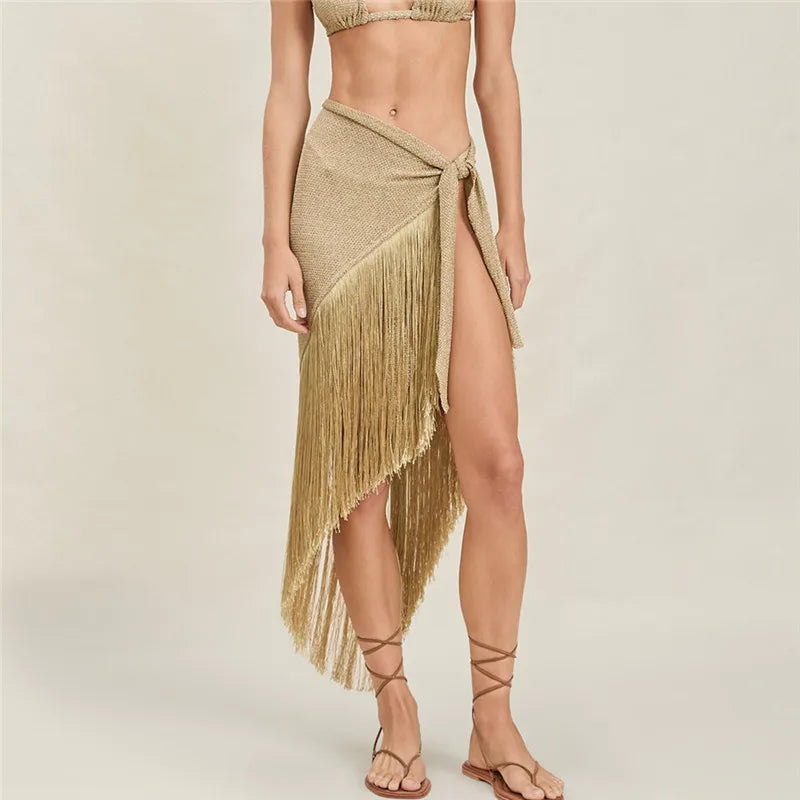 Women's gold halter-top with fringed detail, perfect for beachwear