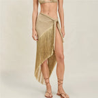 Women's gold halter-top with fringed detail, perfect for beachwear