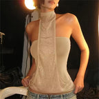 Beige halter-top, sheer mesh material, perfect for summer outings