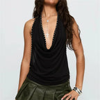 Women's black halter-top shirt with plunging neckline and studded details