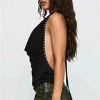 Women's black halter-top with studded accents for casual outings