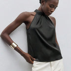 Women's black halter-top made of sleek fabric for casual outings