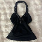 Black halter-top with sequin detail, perfect for summer outings