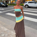 Women's halter-top maxi dress in brown, teal, and yellow for summer outings