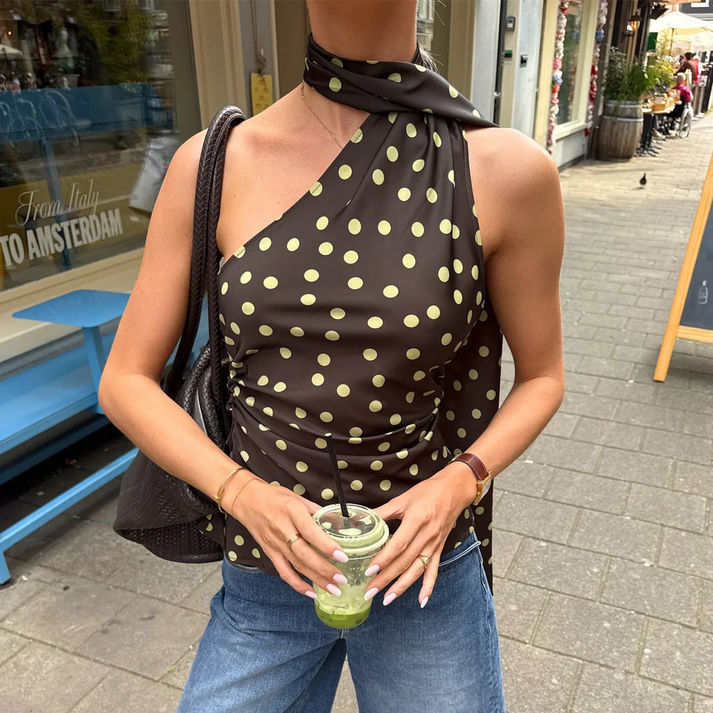 Women's black polka dot halter-top, stylish for casual outings