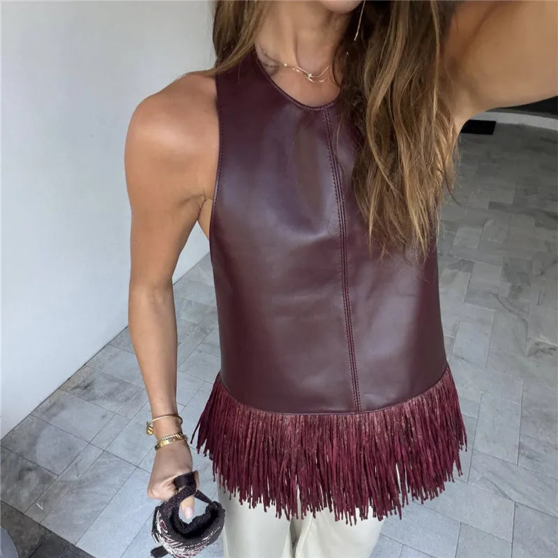 Women's burgundy leather halter-top with fringe detail for stylish outings