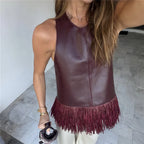 Women's burgundy leather halter-top with fringe detail for stylish outings