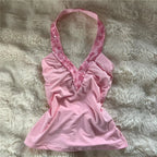 Pink halter-top with floral design, perfect for summer outings