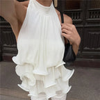 Women's white halter-top blouse with ruffled design, perfect for summer outings