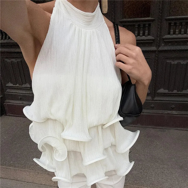 Women's white halter-top blouse with ruffled design, perfect for summer outings