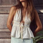 Women's white halter-top made of lightweight fabric, perfect for summer