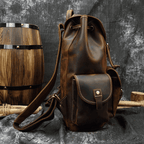 Handcrafted leather backpacks men women in dark brown with adjustable straps and front pocket