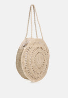 Handmade crochet round bag by London Rag International with intricate circular design and dual straps