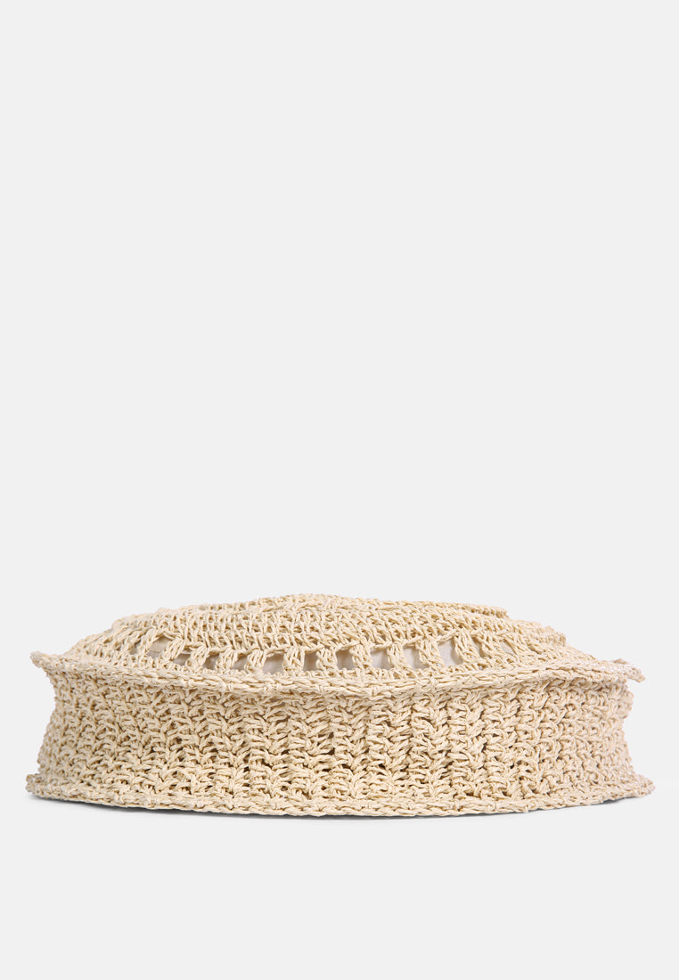 Handmade crochet round bag in natural color, perfect for casual outings and beach days