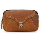VacationGrabs hands-free belt pouch in tan leather with a zipper closure and stylish design