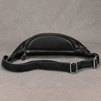 Stylish black hands-free leather fanny pack with sleek design and adjustable strap for convenient travel