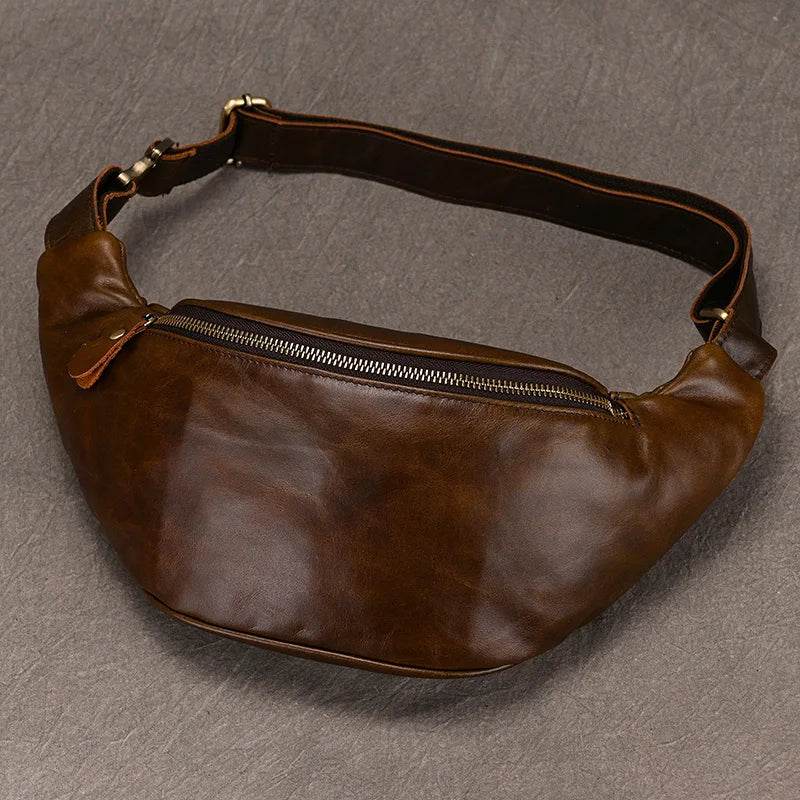 Hands-free leather fanny pack in brown, featuring a sleek design and adjustable strap for convenience