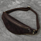 Stylish hands-free leather fanny pack in dark brown with a zippered compartment for easy access