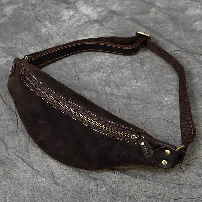 Stylish hands-free leather fanny pack in dark brown with a zippered compartment for easy access