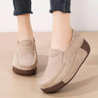 Women's beige flats with suede material, comfortable for casual wear