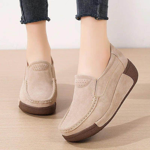 Women's beige flats with suede material, comfortable for casual wear