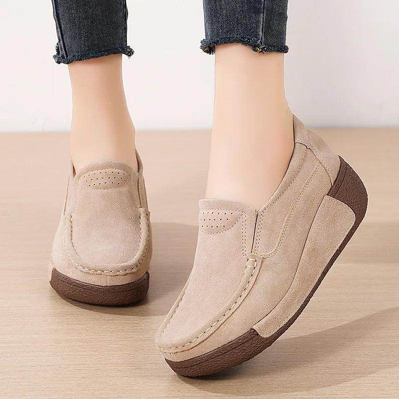 Women's beige flats with suede material, comfortable for casual wear