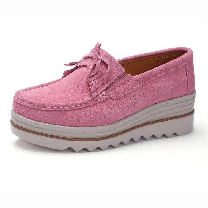 Women's pink suede platform flats, ideal for casual outings and comfort
