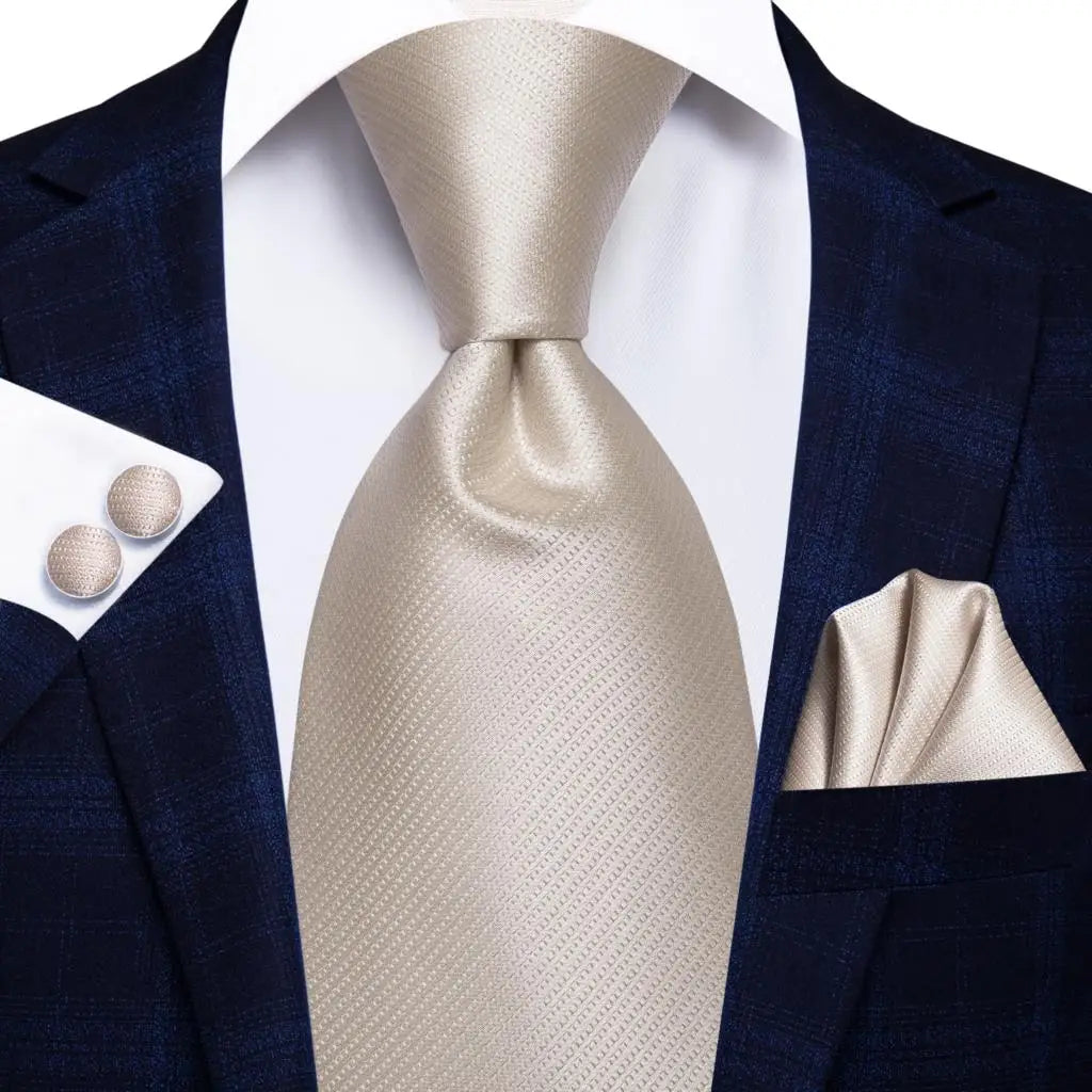 Elegant men's beige tie with matching pocket square for formal events