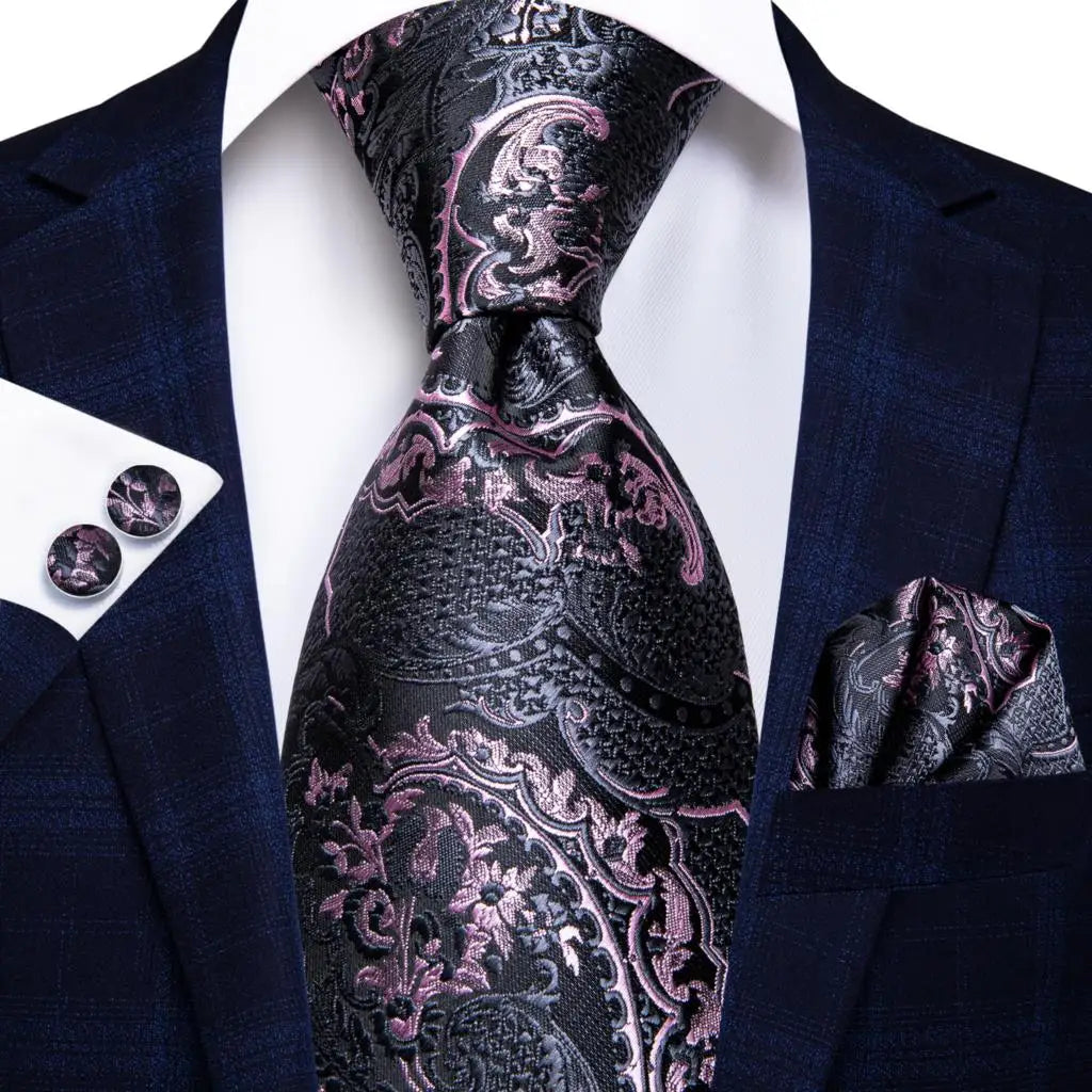 Stylish blue tie collection with intricate patterns for formal occasions