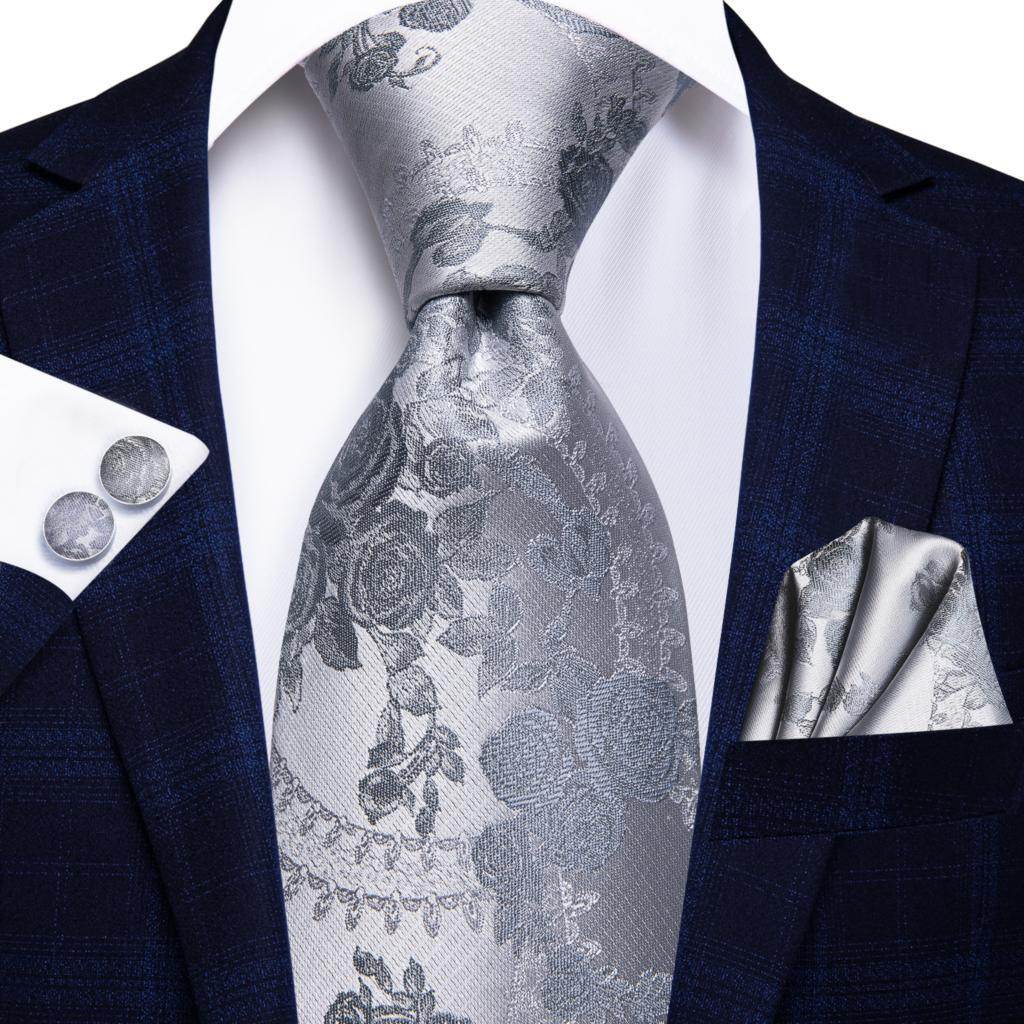 Elegant gold paisley formal tie paired with a dark suit for sophisticated style