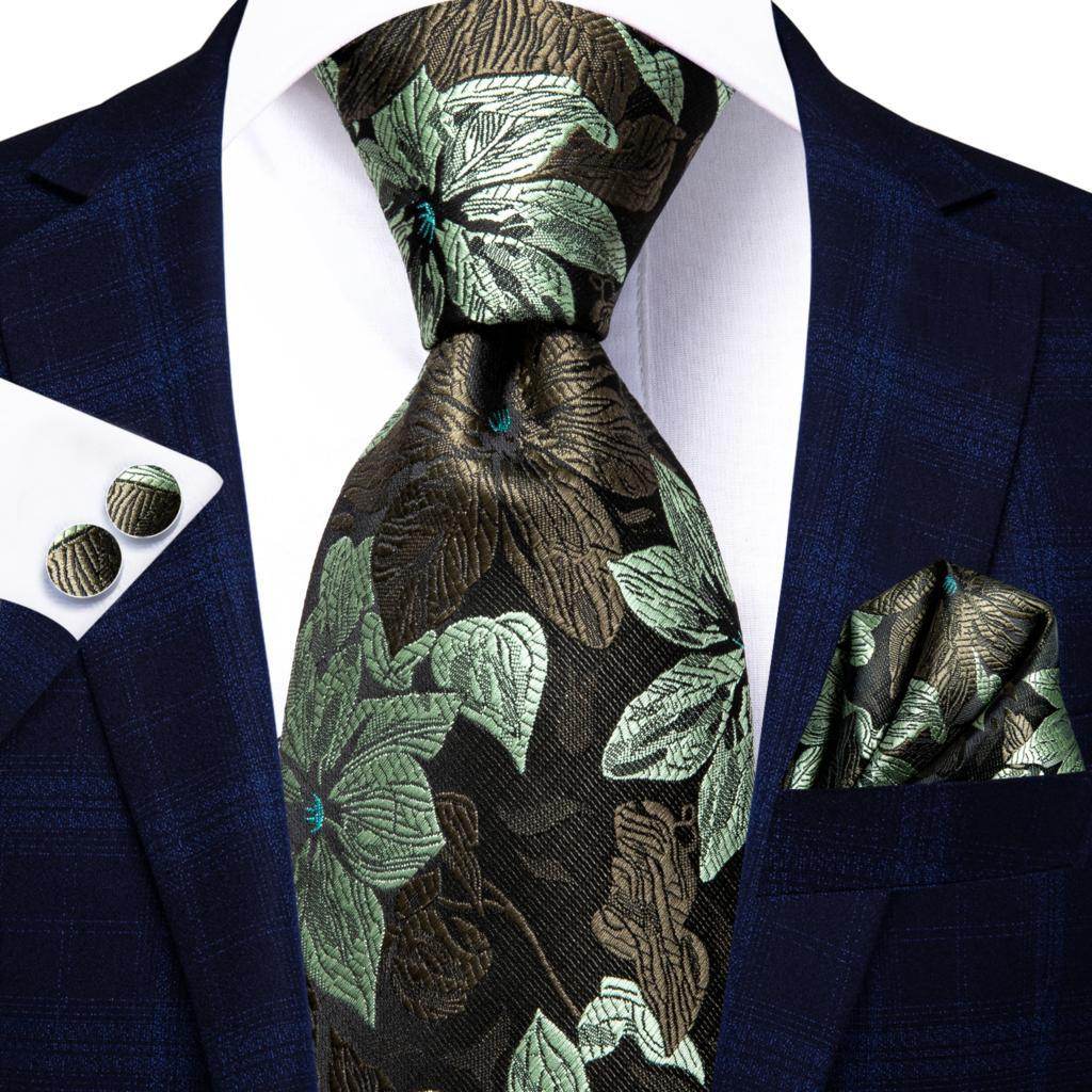 Gold paisley formal tie paired with a stylish dress shirt and pocket square for an elegant look