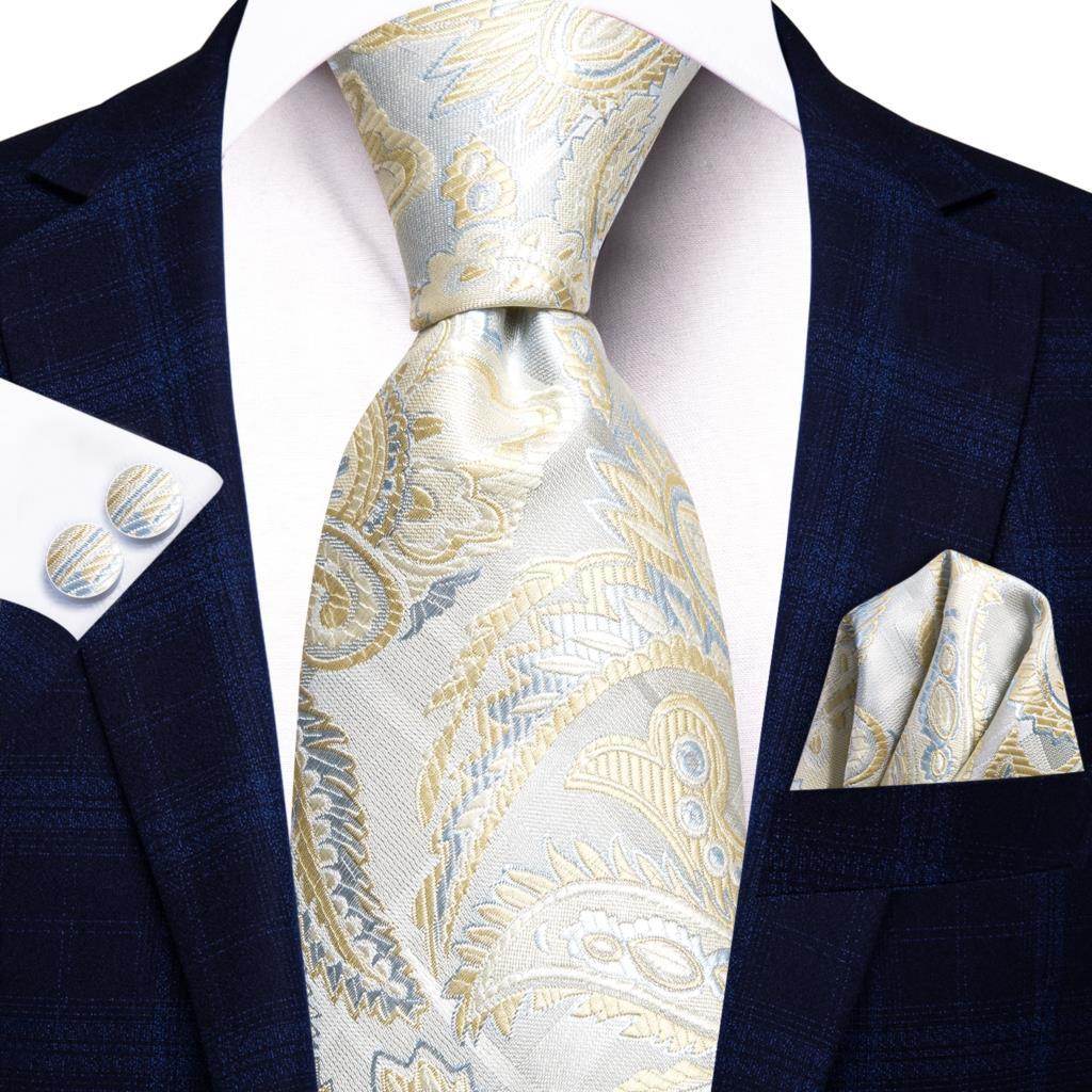 Gold paisley formal tie paired with matching pocket square, perfect for elegant attire
