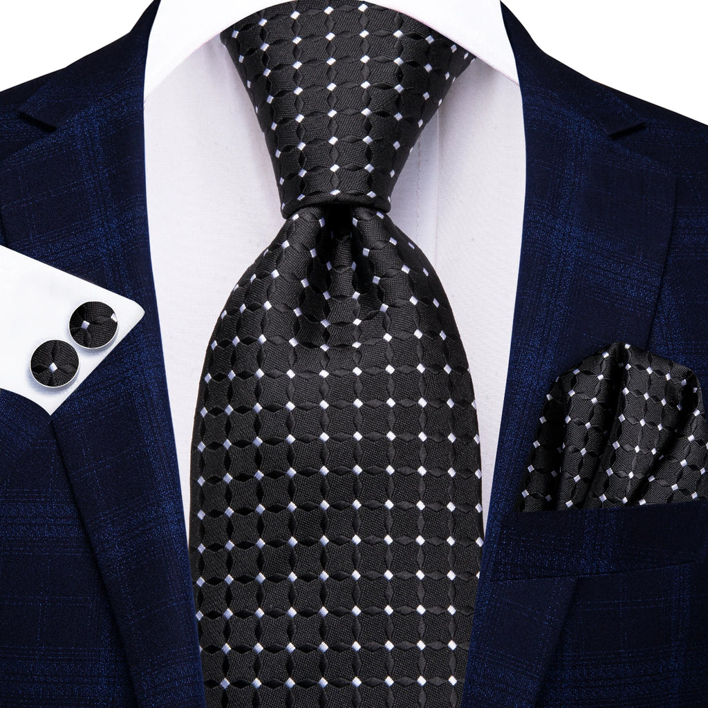 Men's black silk tie with geometric pattern, perfect for learning how to tie mens tie